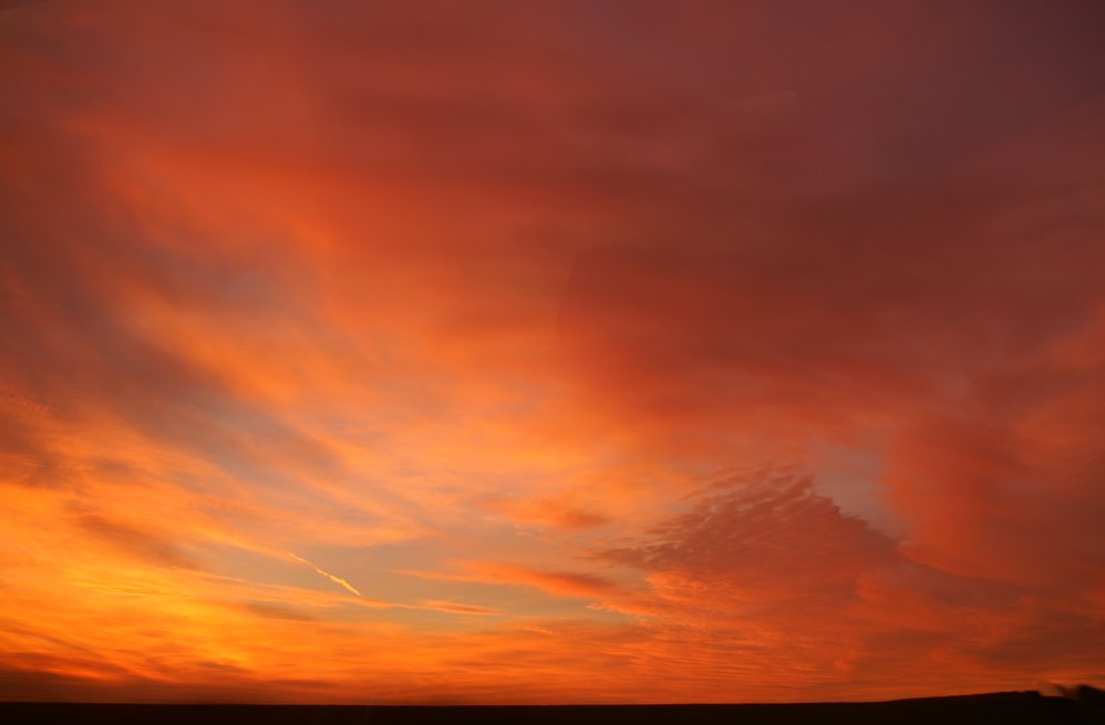 Sunset, taken from a moving train near Southampton